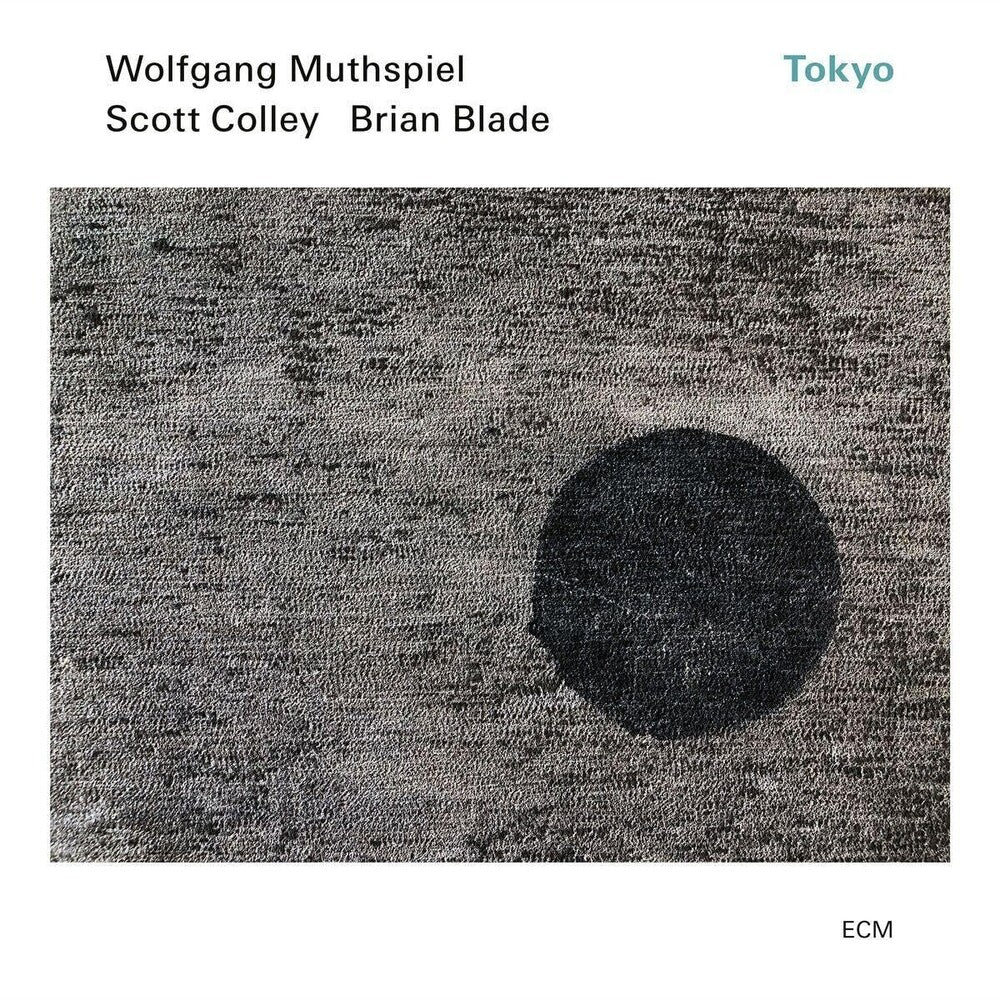 the album cover for Wolfgang Muthspiel / Colley,Scott / Blade,Brian - Tokyo