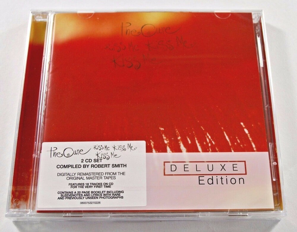 the album cover for The Cure - Kiss Me Kiss Me Kiss Me: Deluxe Edition [Import]