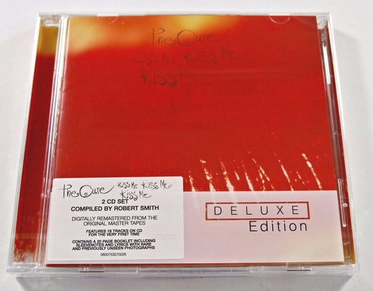 the album cover for The Cure - Kiss Me Kiss Me Kiss Me: Deluxe Edition [Import]