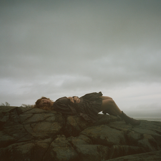 the album cover for Bella White - A Sign In The Weather