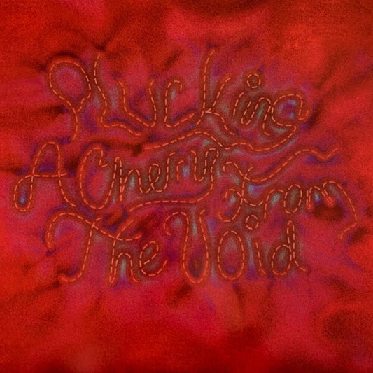 the album cover for Cecile Believe - Plucking A Cherry From The Void - Clear [Clear Vinyl]