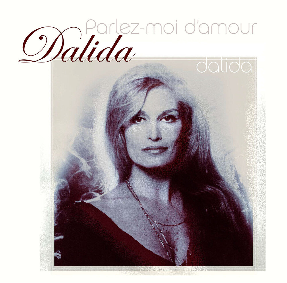 the album cover for Dalida - Parlez-Moi D'amour [Colored Vinyl] [Limited Edition] (Wht) (Ylw) (Hol)