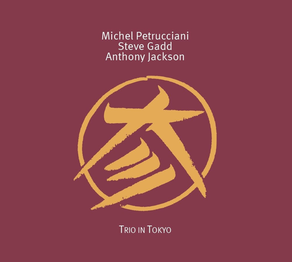 the album cover for Michel Petrucciani - Trio In Tokyo