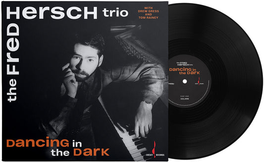 the album cover for Hersch Fred Trio - Dancing In The Dark [180 Gram]