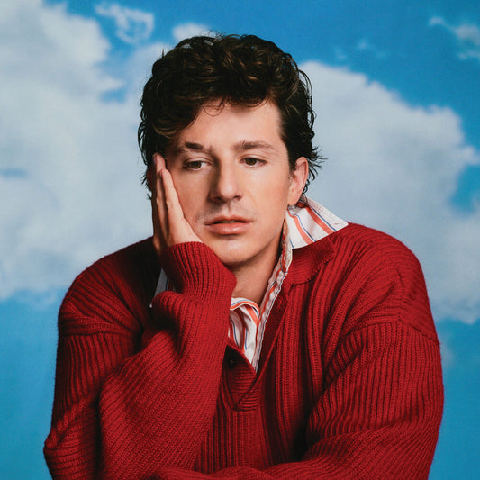 the album cover for Charlie Puth - Whatever's Clever (Post)