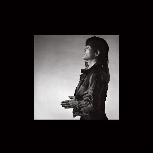 the album cover for Alan Vega - Alan Vega (Blue) [Colored Vinyl] [Deluxe] [Remastered]