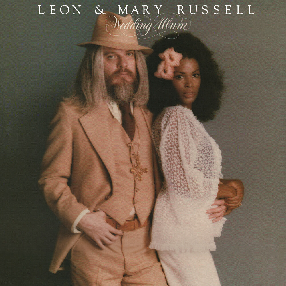 the album cover for Leon Russell - Wedding Album [Clear Vinyl] (Gol) (Aniv)