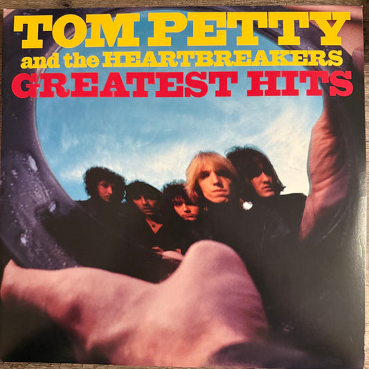 Tom Petty & The Heartbreakers – Greatest Hits (Translucent Orange/Red Swirl, Red/Black/White Swirl) 2LP